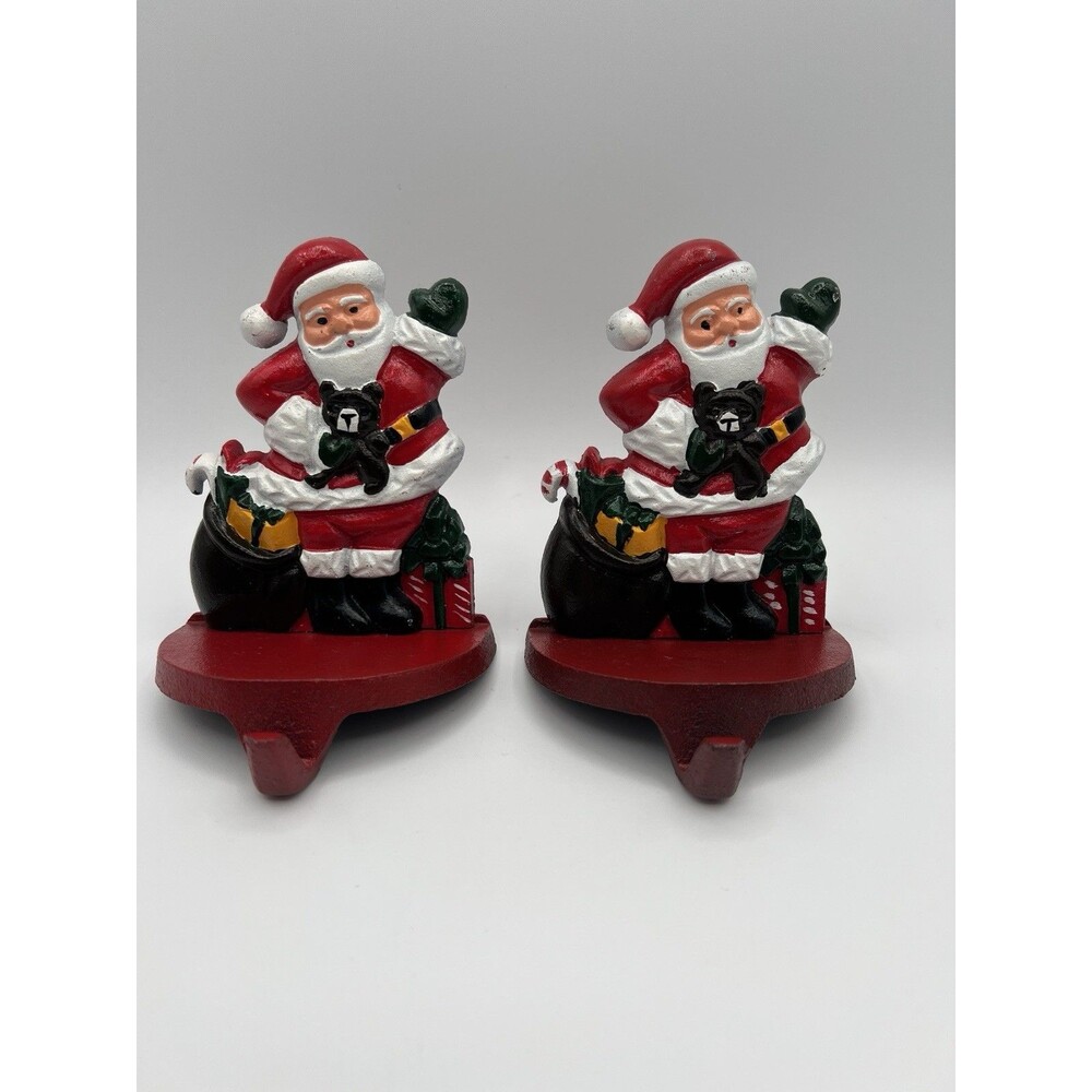 2 Vintage Santa Claus Cast Iron Christmas Stocking Holder Hangers Toys Mantle